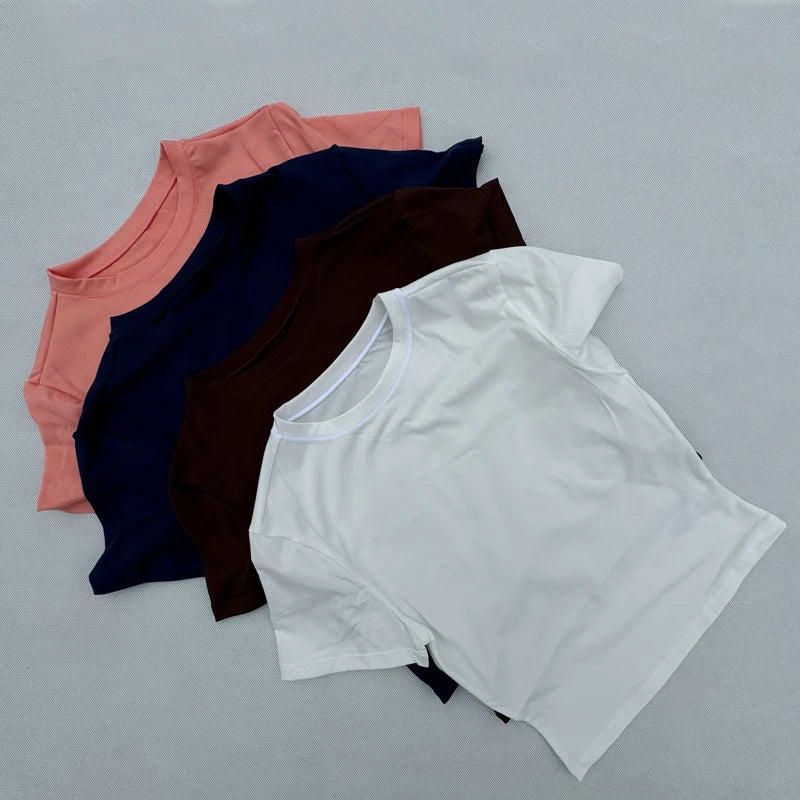 Camiseta FITNES feminina justa de secagem rápida